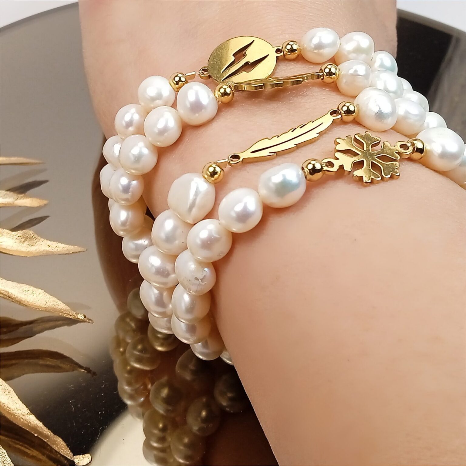 Pulseras perlas varias